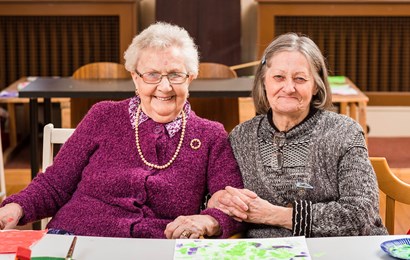 Two ladies smiling