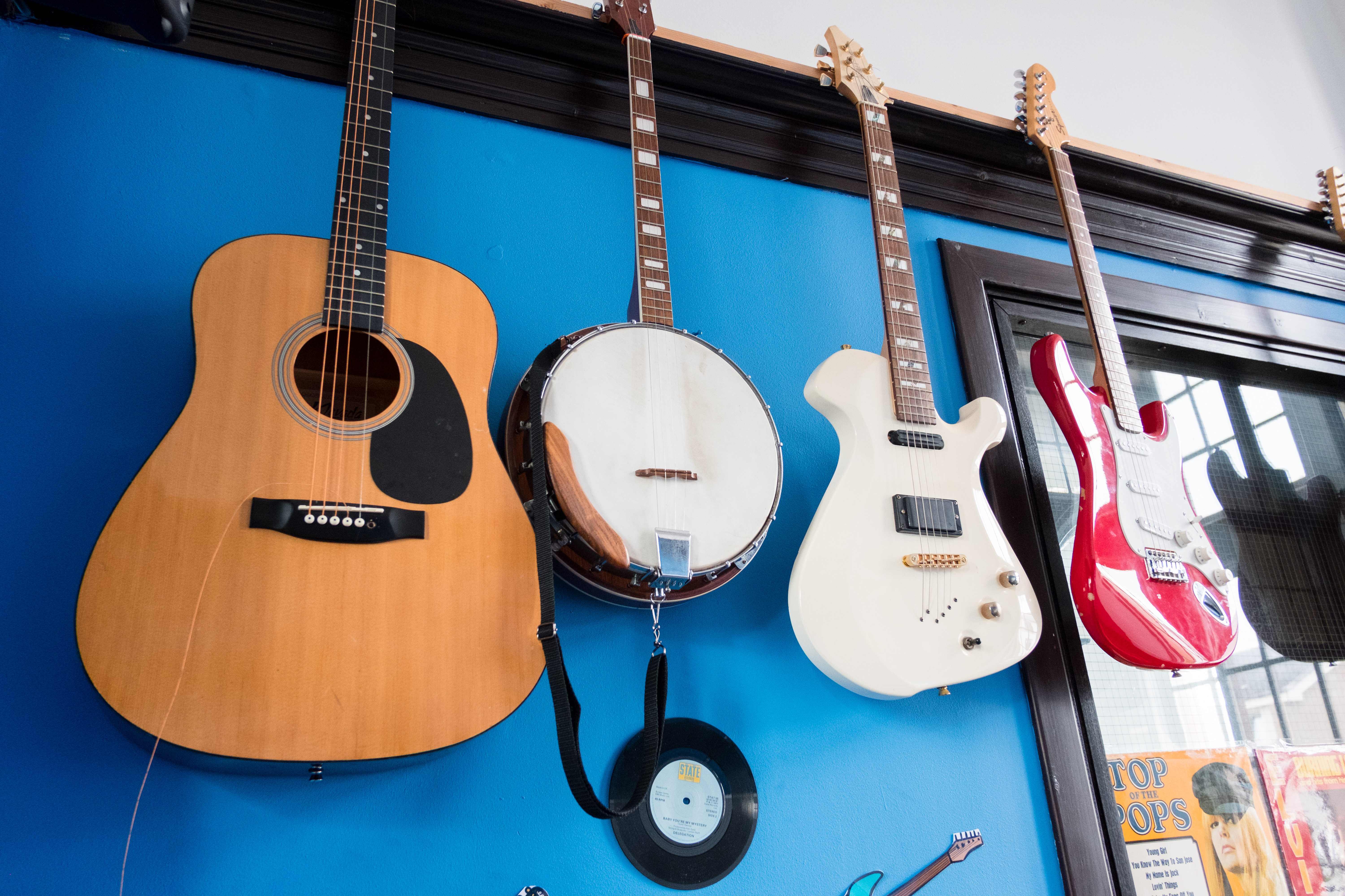 Guitars hanging on the wall