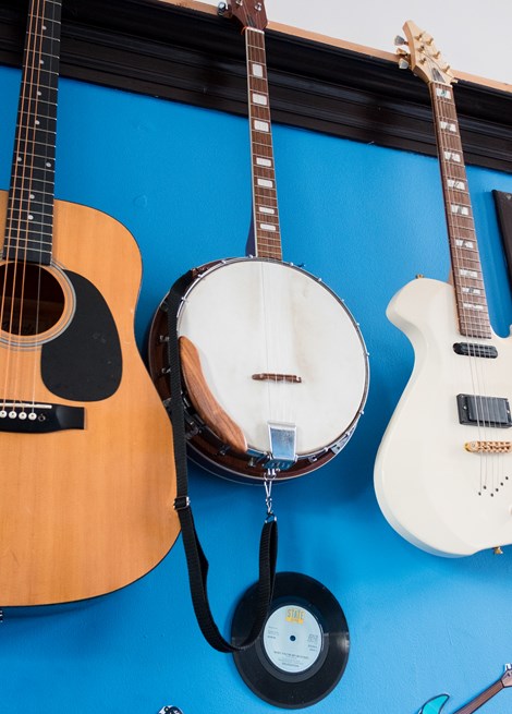 Guitars hanging on the wall