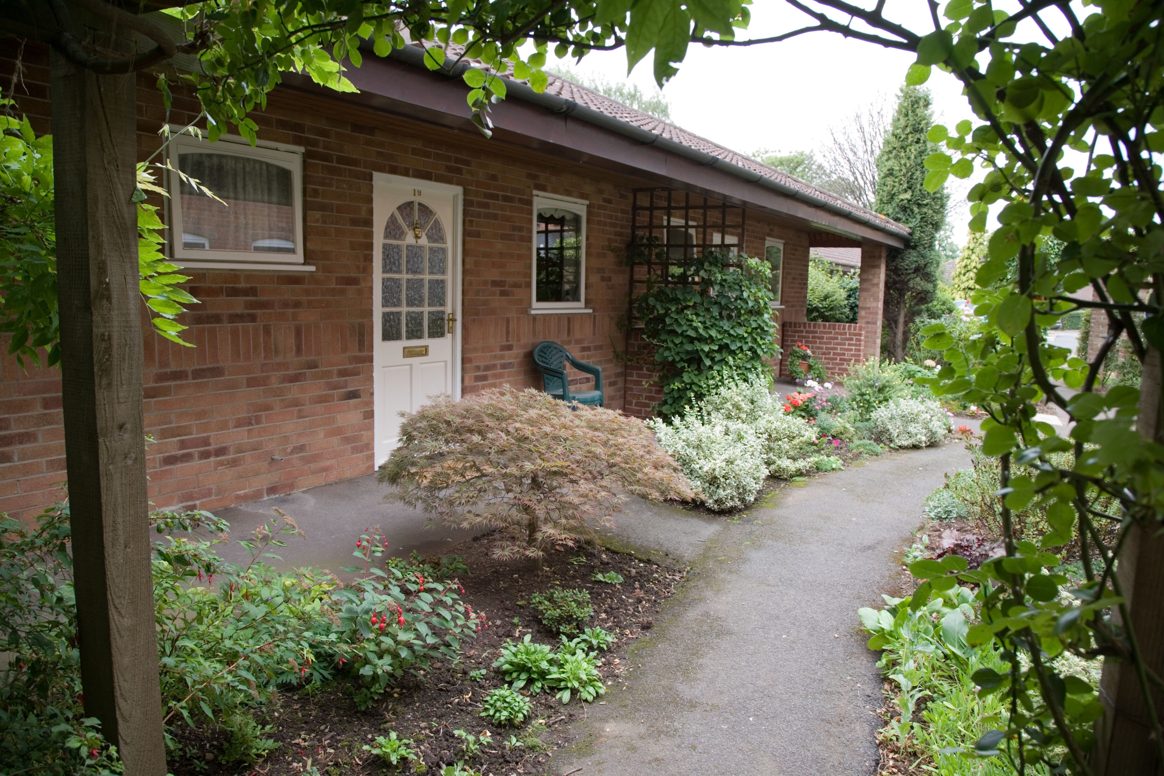 Single storey home with white front door